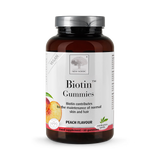 Bottle of New Nordic Biotin Gummies with peach flavor on a white background