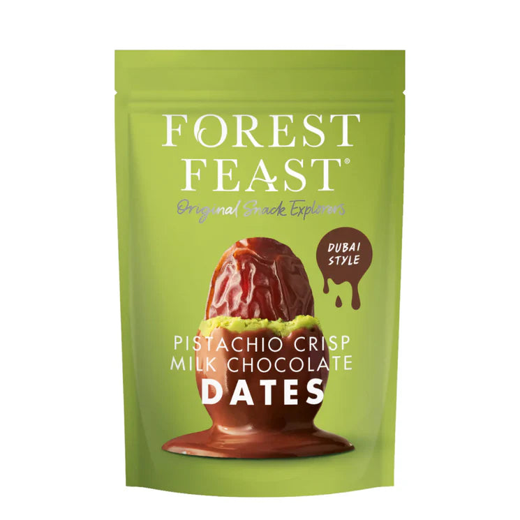 Green packaging of Forest Feast pistachio crisp milk chocolate dates on a white background