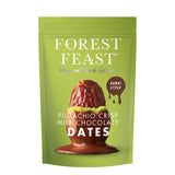Green packaging of Forest Feast pistachio crisp milk chocolate dates on a white background