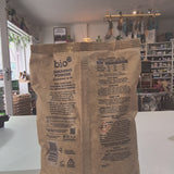 Paper washing powder bag video on a white table 