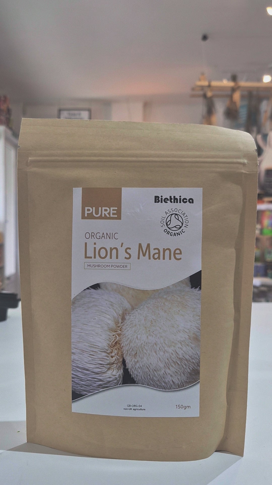 Organic Lion's Mane Mushroom powder on a white surface
