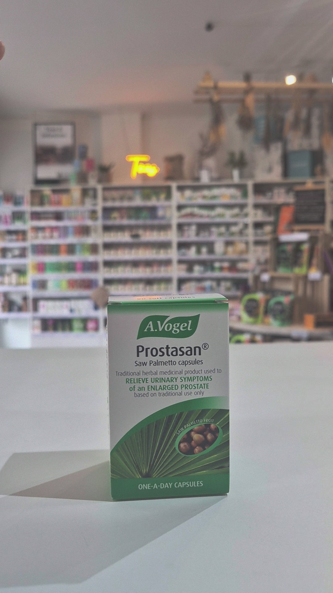 Packaging for A.Vogel Prostasan Palmetto Capsules, showing a bottle and box with green and white labeling video