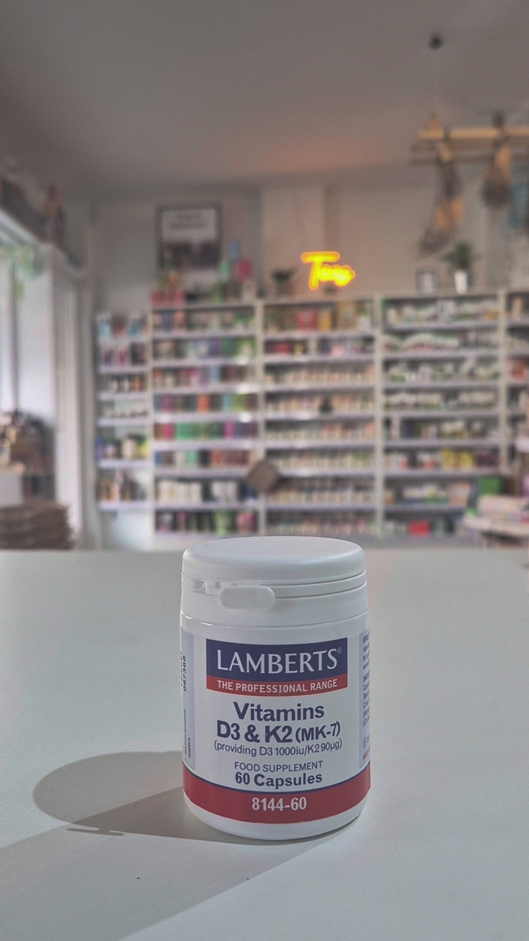 Lamberts Vitamins D3 & K2 supplement container on a white background