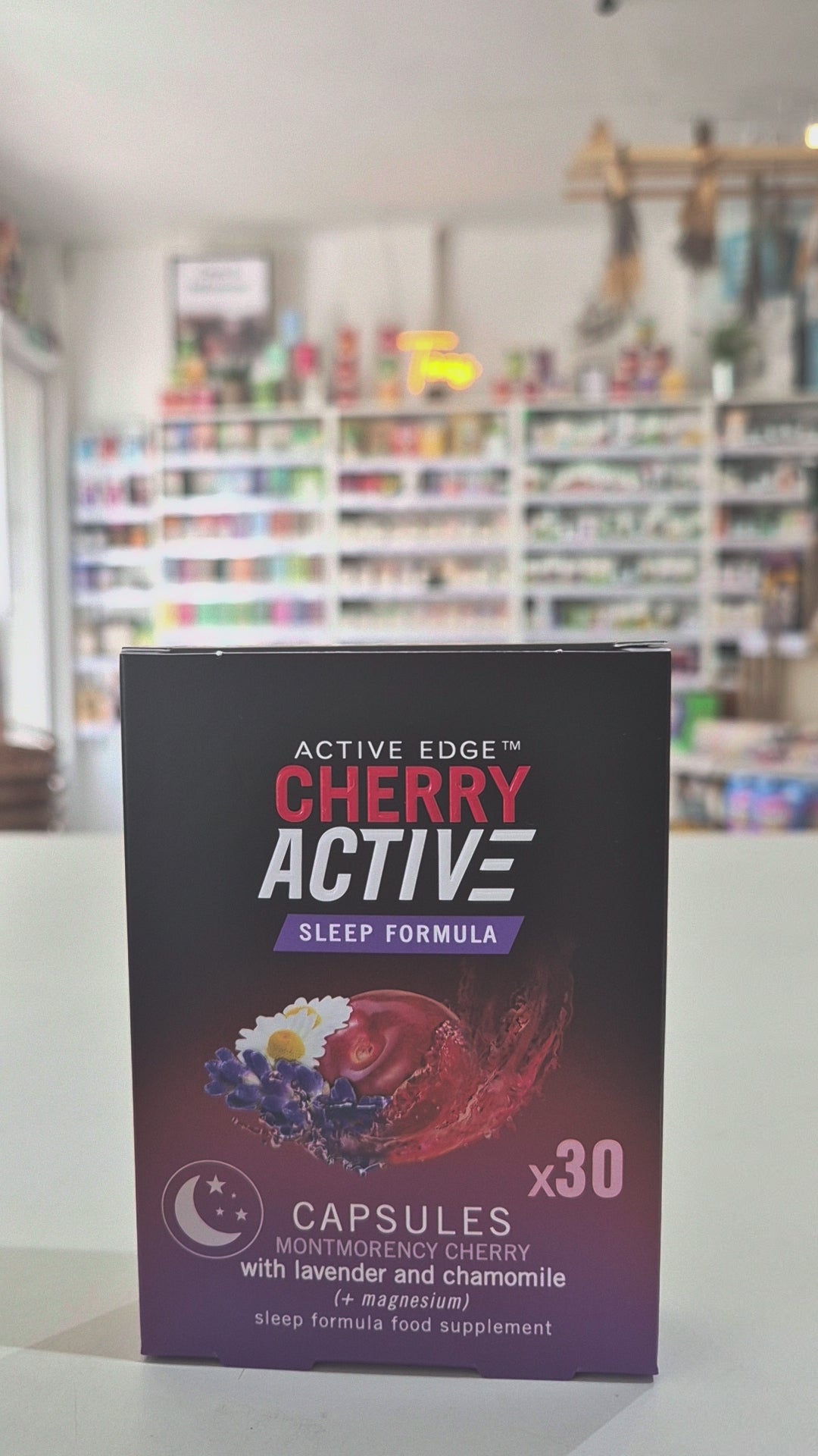 CherryActive Sleep Formula supplement packaging on a shelf with a blurred store background