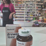 Health Aid Super Brewers Yeast supplement bottle and packaging on a surface.