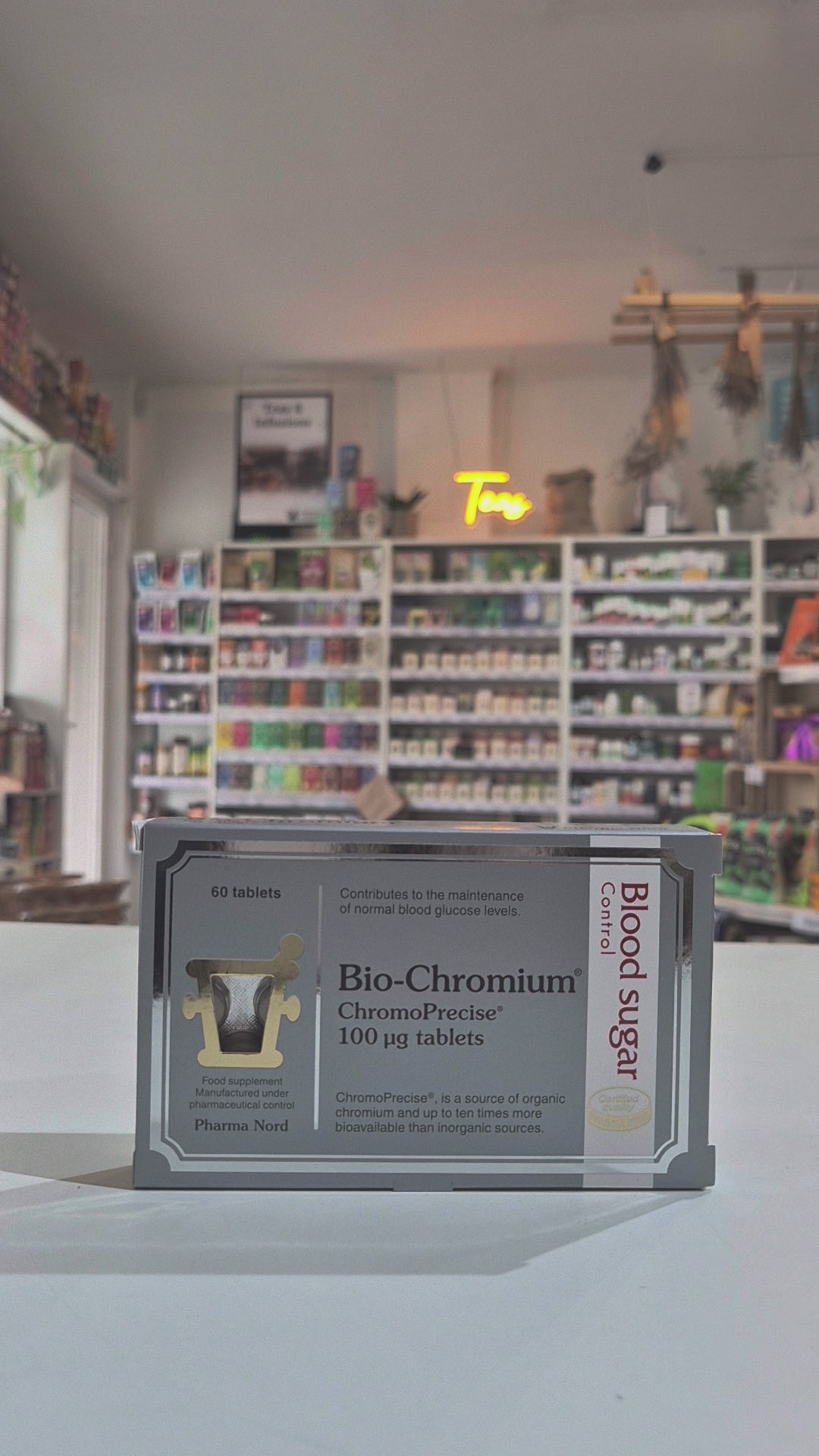 Box of Pharma Nord Bio-Chromium 100 mg tablets with 60 tablets inside. The packaging is predominantly white with purple and silver details.