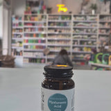 Bottle of Viridian Hyaluronic Acid on a counter in a store setting