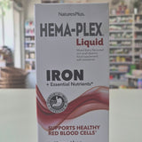 Box of NaturesPlus Hema-Plex Liquid Iron supplement on a counter.