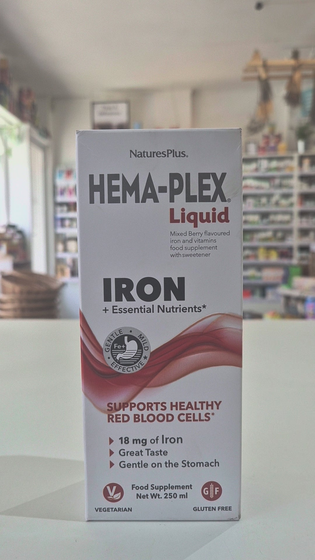 Box of NaturesPlus Hema-Plex Liquid Iron supplement on a counter.