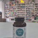 Bottle of Viridian Lutein Eye Complex on a counter with a blurred store background Video