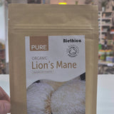 Package of Biethica Pure Organic Lion's Mane mushroom powder in a store setting