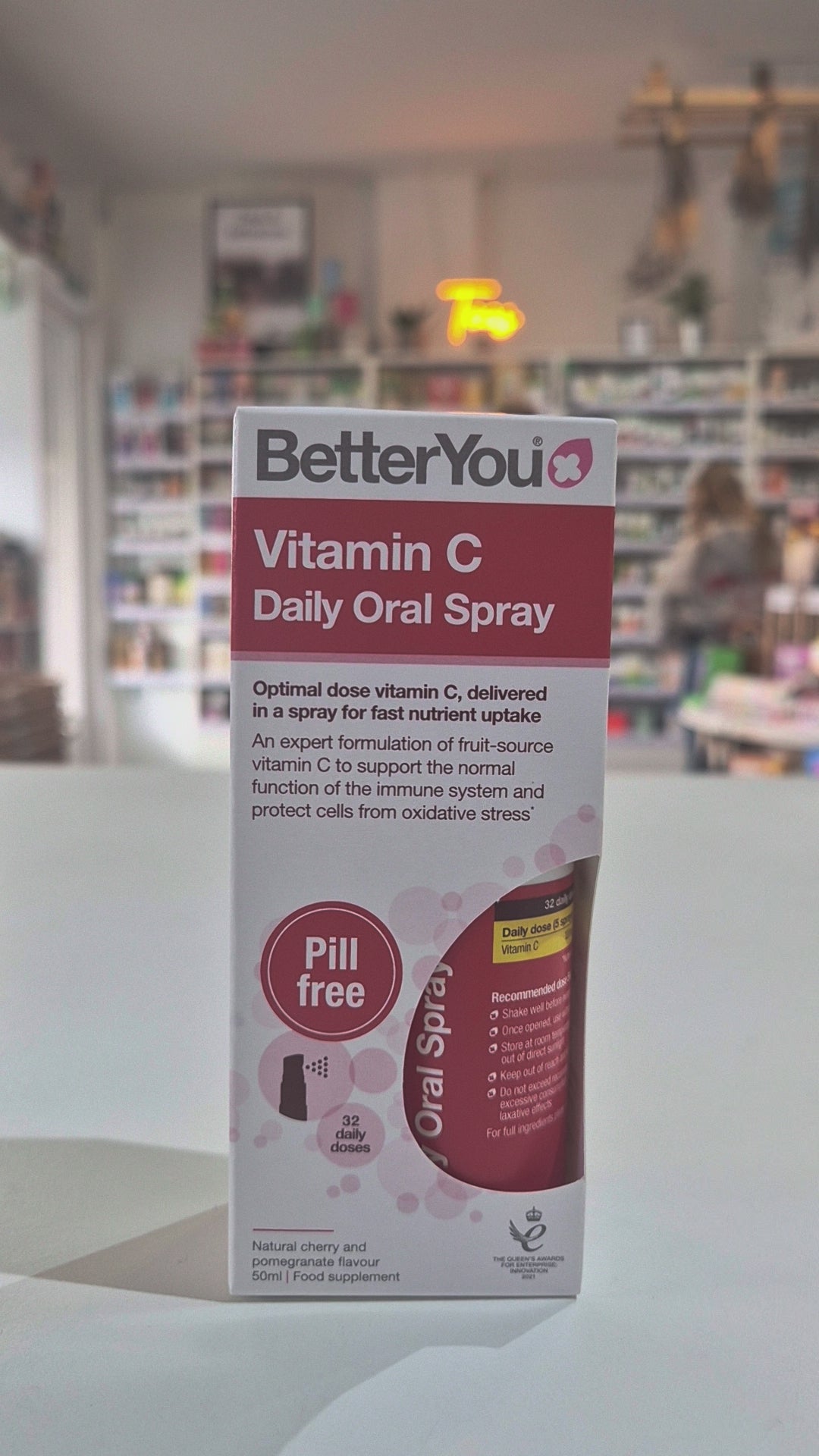 Box of BetterYou Vitamin C Daily Oral Spray in a shop background video