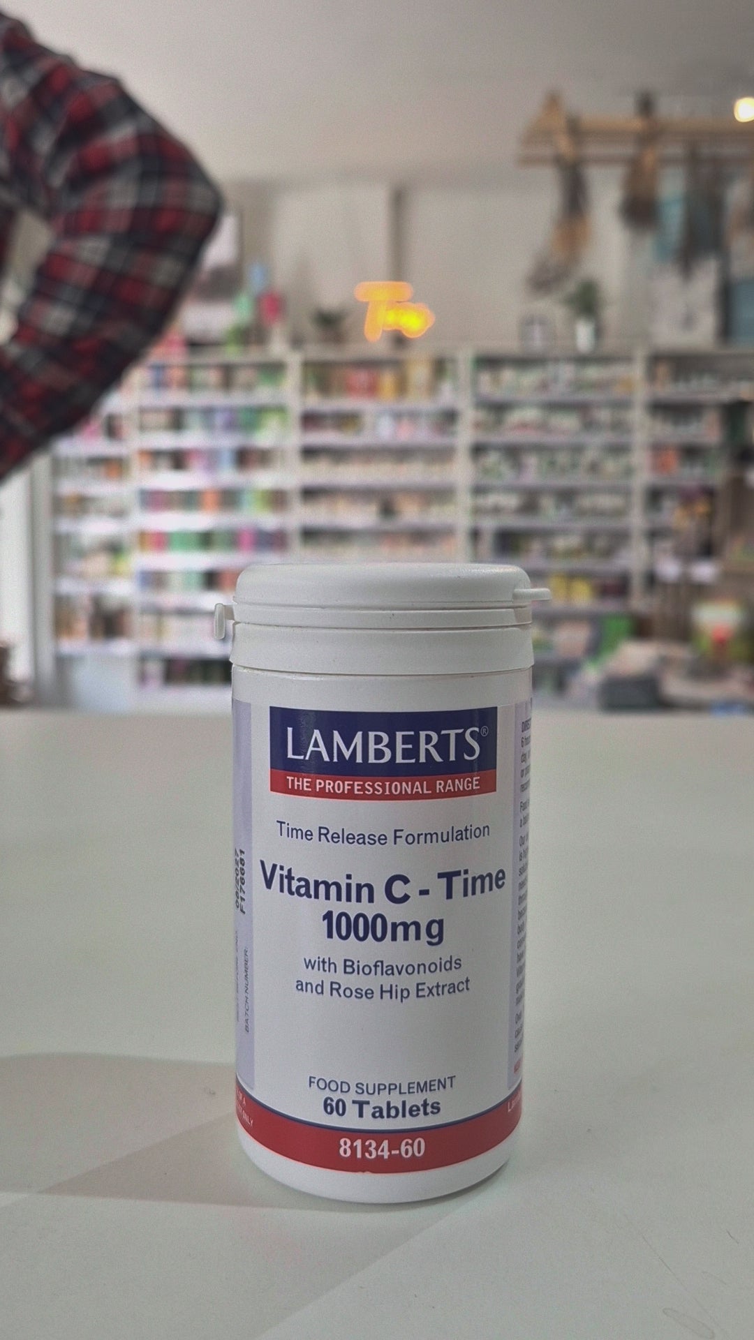 Lamberts Vitamin C-Time 1000mg supplement container on a table