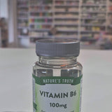 Bottle of Nature's Truth Vitamin B6 100mg on a white surface