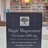 Box of New Nordic Magic Magnesium Glycinate 600 mg supplement on a blurred store shelf background