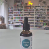 Bottle of Viridian Liquid B12 on a table with a blurred store background video