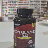 Bottle of Iron Gummies with Vitamin C on a counter in a store setting