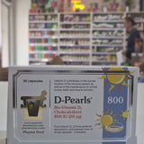 Box of D-Pearls Vitamin D supplement with sun design on a white background
