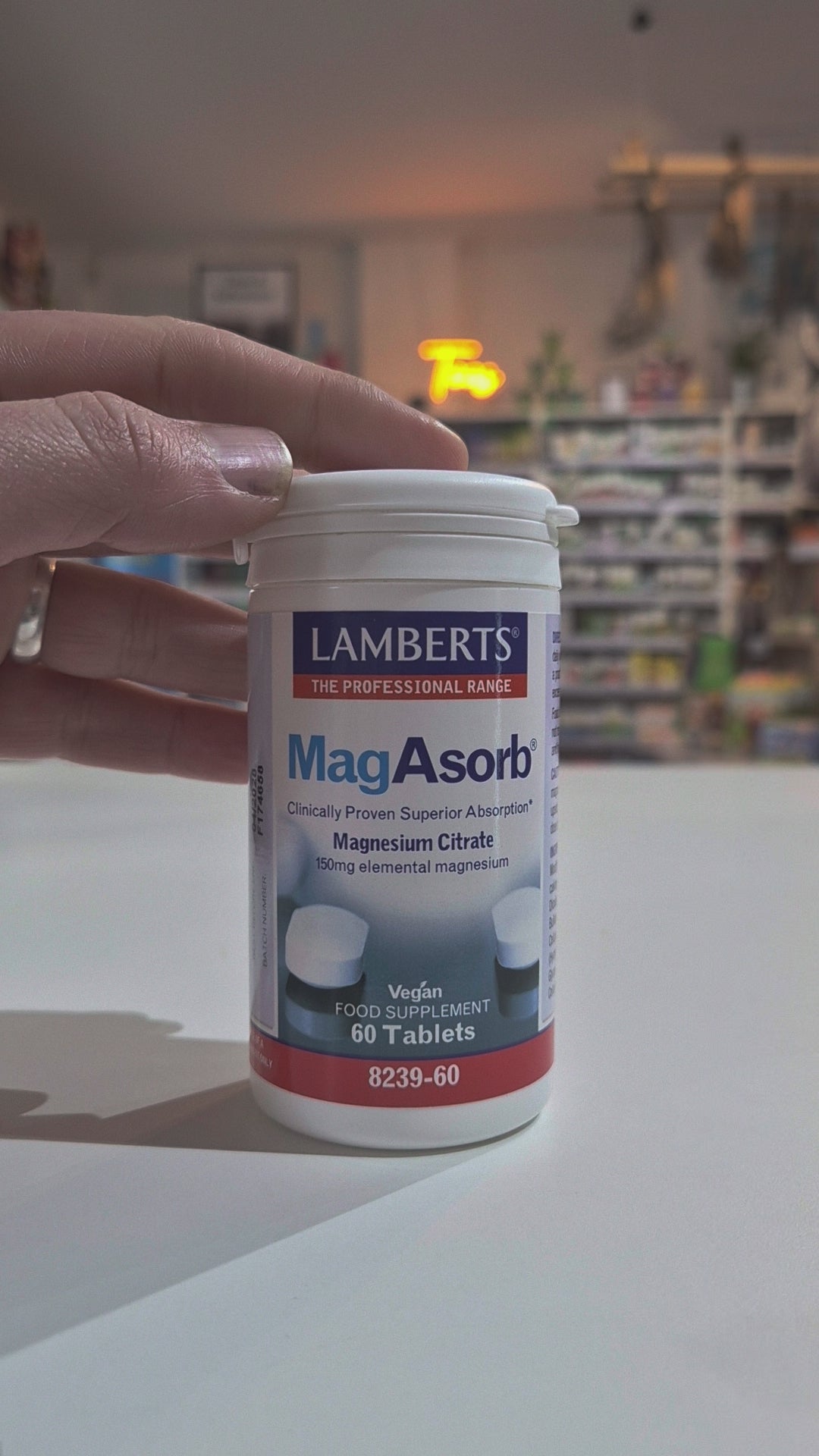 Lamberts MagAsorb supplement container on a counter in a store setting