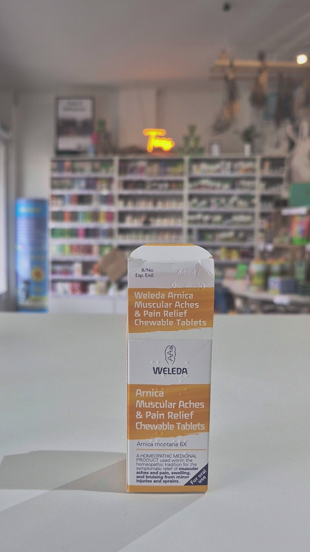 Arnica box and bottle, white and yellow