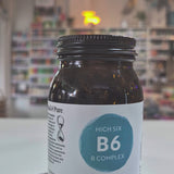 Jar of Viridian High Six B6 B Complex supplement on a counter with a blurred store background video