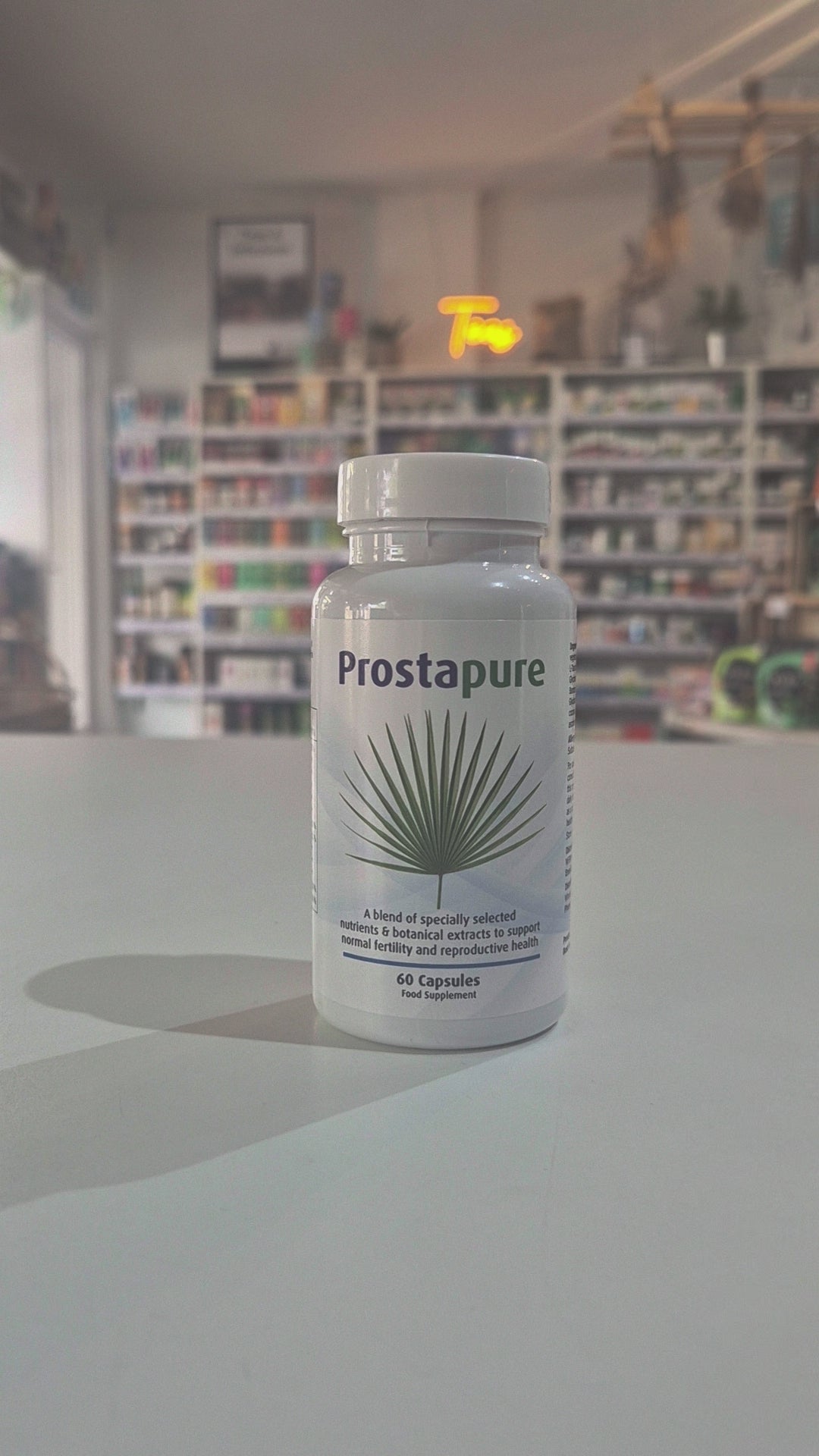 A bottle of Prostapure supplements with 60 capsules, labeled for supporting prostate health and reproductive health with a blend of nutrients and botanical extracts video. 