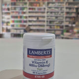 A container of Lamberts Vitamin E supplement with 60 capsules, indicating 400iu (268mg) strength, and marked as vegan.
