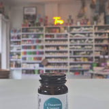 A bottle of Viridian Nutrition L-Theanine & Lemon Balm supplement, with 30 capsules inside, labeled with the product name and strength of 500mg.