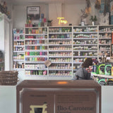 Box of Bio-Carotene Capsules on a counter with a store shelf in the background video
