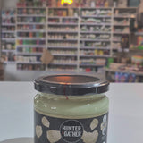 Jar of organic Hunter & Gather all-natural Organic Tallow on a white surface with a blurred background
