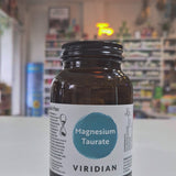 Bottle of Viridian Magnesium Taurate on a counter in a store setting