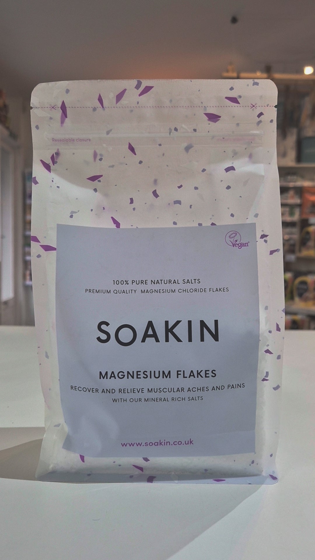 Bag of Soakin magnesium flakes with a visible label on a white background