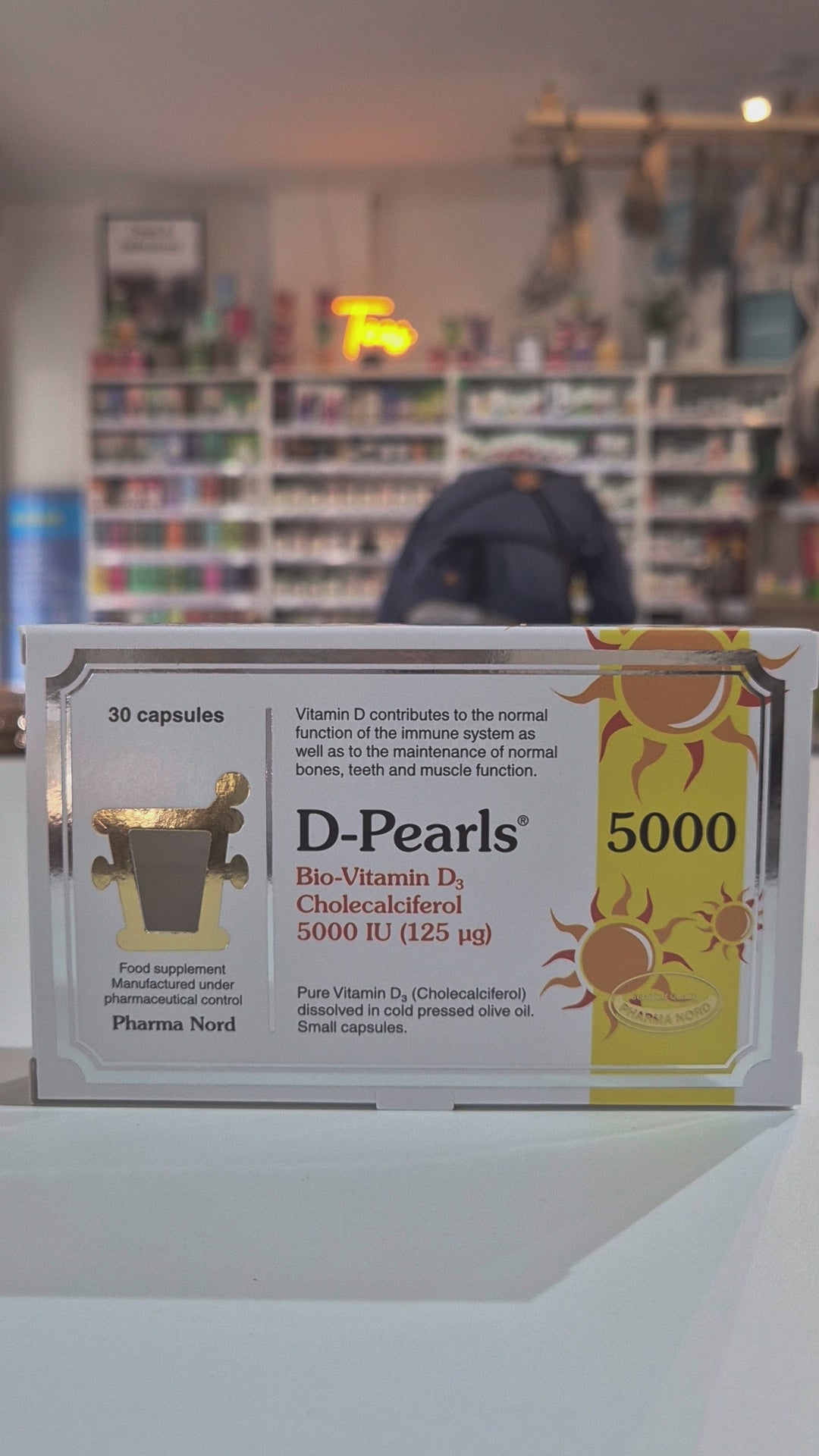 Box of D-Pearls Bio-Vitamin D3 capsules with vitamin information on a white background