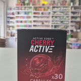 Red and black Montmorency Cherry supplement container with 'CherryActive' branding in a store setting
