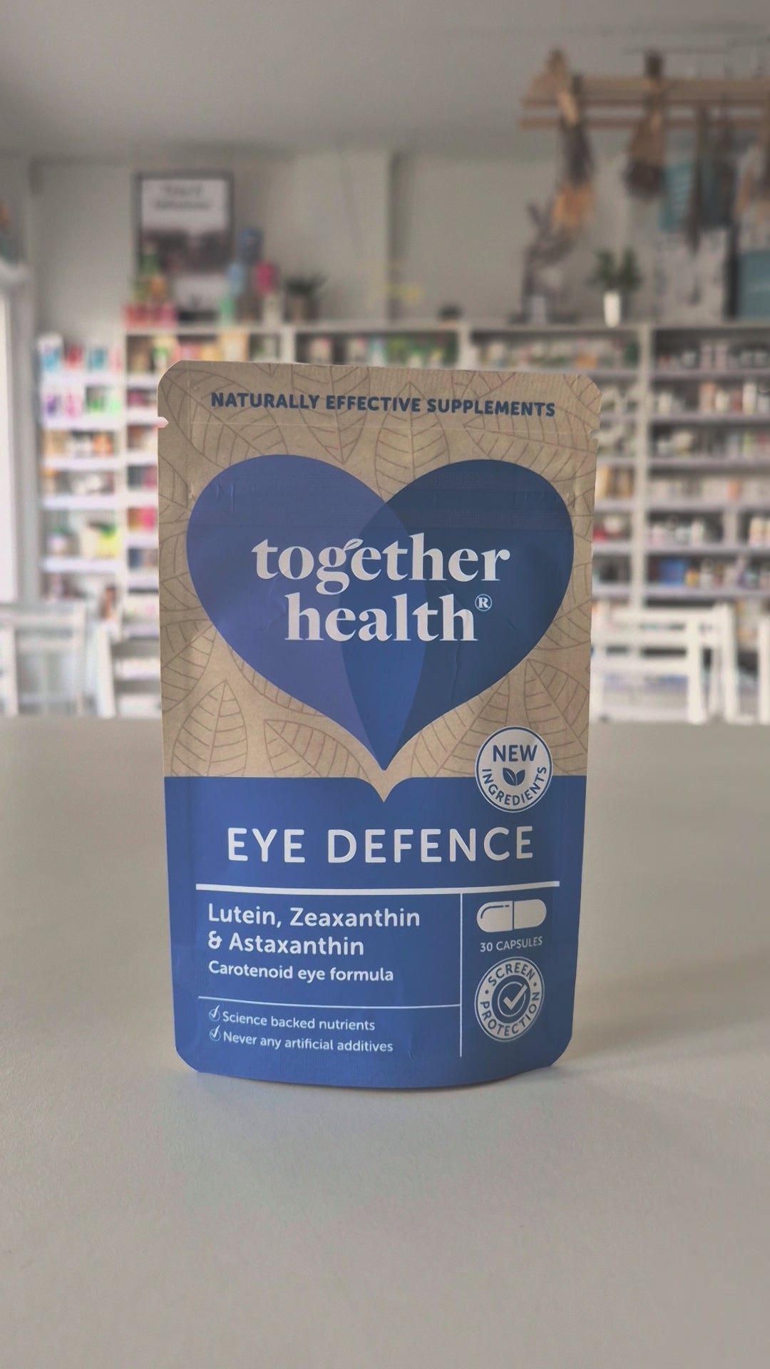 Together Health Eye Defence supplement package with two capsules on a white background video