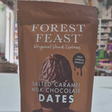 Bag of Forest Feast salted caramel milk chocolate dates on a neutral background