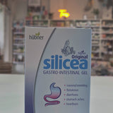 Packaging of Hubner Original Silicea Gi Gel 200Ml for gastro-intestinal complaints, displaying indications such as nausea, vomiting, flatulence, diarrhoea, stomach aches, and heartburn in a shop, on a counter video