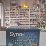 A box of Syno-Vital Joint Thinking Oral Hyaluronic Acid Plus Vitamin C sachets, with a blue color scheme and an illustration of a joint. The box states it contains 30 x 5ml sachets and is a liquid food supplement video