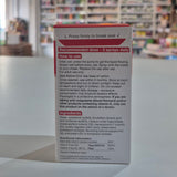 Supplement bottle with label on a blurred background