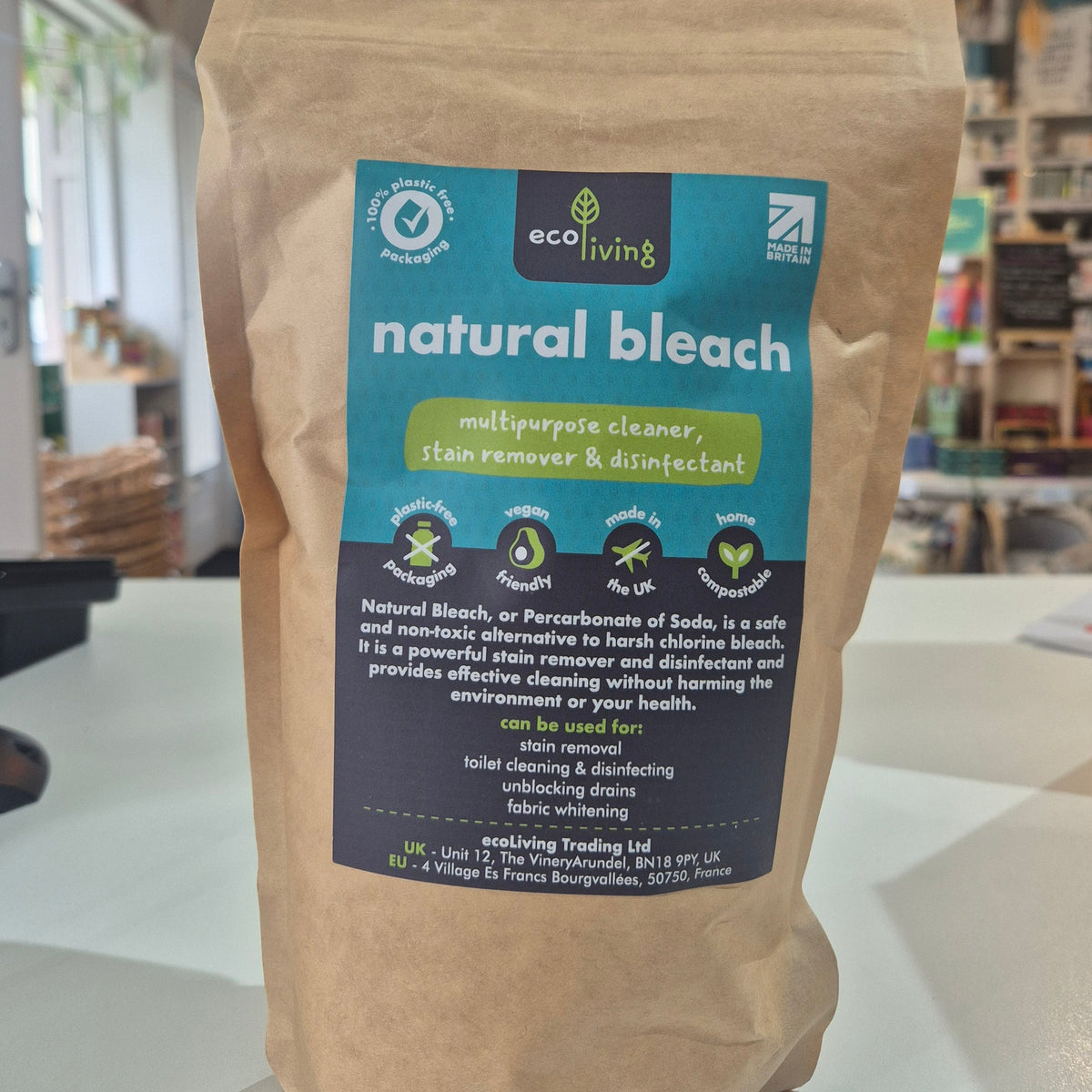 Bag of natural bleach with a label on a white surface