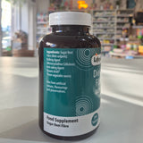 Supplement bottle labeled 'Lifeplan on a counter with a blurred store background