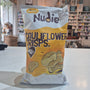 Packaged cauliflower chips cheese and caramelised onion with 'Nudie' branding in a store setting