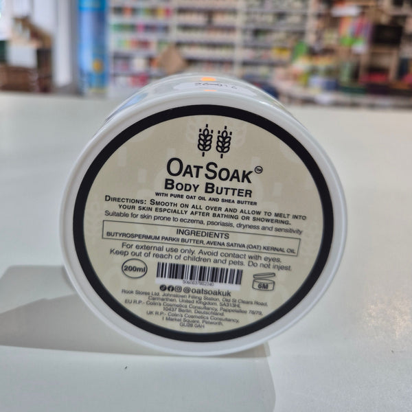 Oat Soak body butter container with label in a store setting