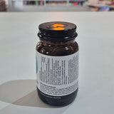 Viridian Co-Q10 & MCT supplement bottle on a white surface with a blurred store background