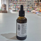 Bottle of Viridian Vitamin D3 & K2 Liquid on a table with a blurred store background Ethical & Pure supplement.