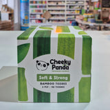 Box of Cheeky Panda bamboo tissues with green and white design on a store shelf background