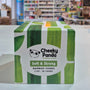 Box of Cheeky Panda bamboo tissues with green and white design on a store shelf background