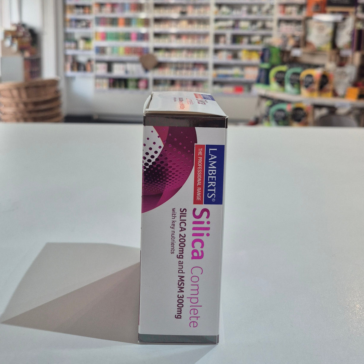 Box of Lamberts Silica Complete on a white surface with a blurred store background