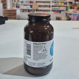 Myo-Inositol & Folic supplement bottle with Viridian label on a white surface, with  blurred store interior in the background