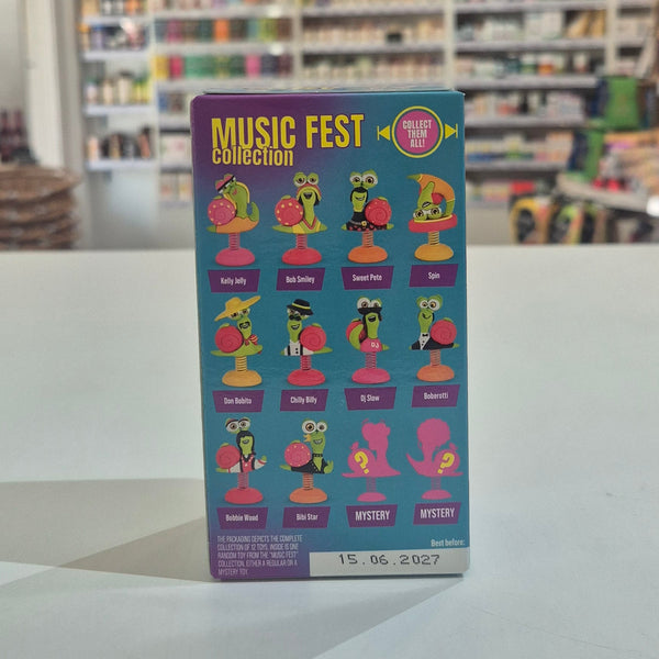 Box of Bob Snail Music Fest Collection with colorful characters on a table in a store setting